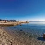 Апартаменты Cozy In With House Sea View *